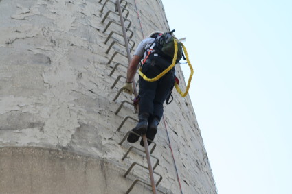 Concrete Industrial Chimney Showing Signs of Spalling