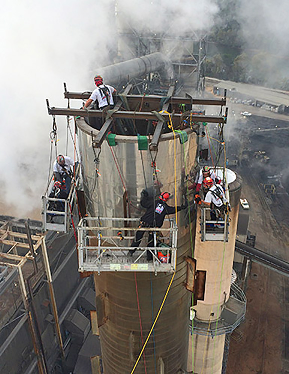 rope access platforms on smokestack industrial chimney