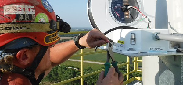 Installing obstruction lights on industrial chimney