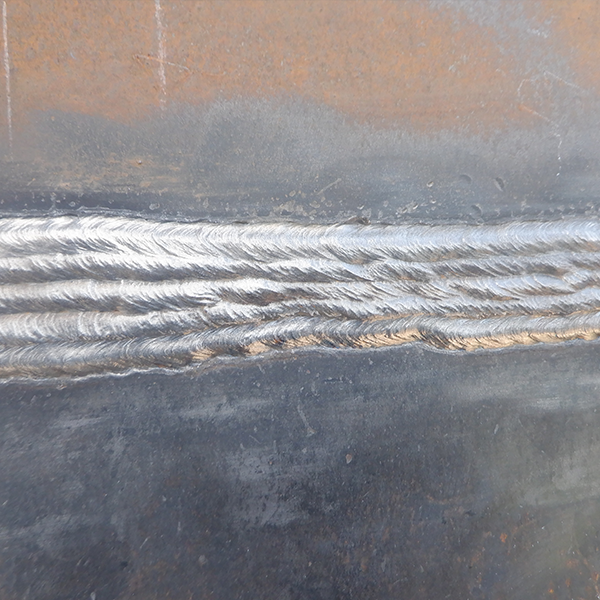 Splice weld for industrial chimney